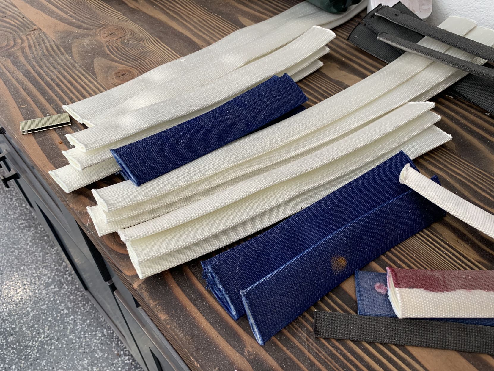 Making flags from recycled fire hoses in Napa